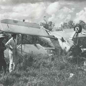 100b Close up of Stearman PT-17 - number 22 upside down on island in Lake Okeechobee