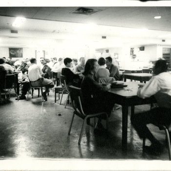 Students Sit at Tables