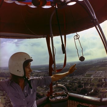 Woman in Balloon Canopy in the Sky over Tampa
