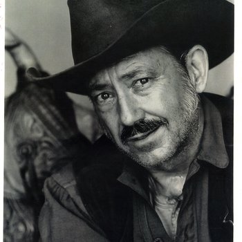 Western-style headshot, Hal Riddle