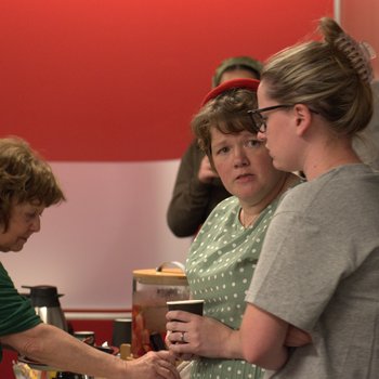Guests at the Food Table