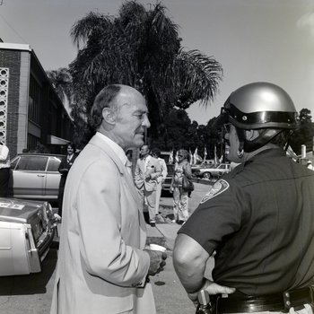 Jack Eckerd Speaks with Police Officer