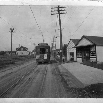 Streetcar on Buchanan Street with a broadside advertising a temperance meeting at the Ryman Auditorium, Nashville, Tennessee, June 28, 1907