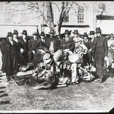 Sheriff and deputies surrounding broken stills beside the Presbyterian Church, Jonesborough, Tennessee, 1920