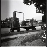 Black and white photograph of confiscated moonshine still on a wagon in Sequatchie County, 1959