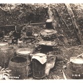 Moonshine Still postcard, Etowah, Tenn.