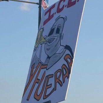 Photograph of "I.C.E. y Fuera" Protest Sign