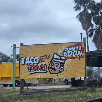 Photograph of "Tacos N' Todo: Coming Soon" Sign