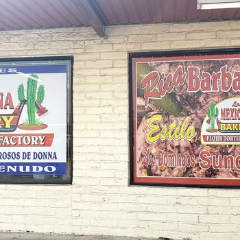 Photograph of La Mexicana Bakery y Rica Barbacoa Signs