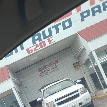 Photograph of Frontera Collison Auto Parts Spanglish Garage Sign