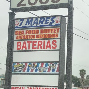 Photograph of "Antojitos Mexicanos Seafood Buffet" y otros negocios Sign