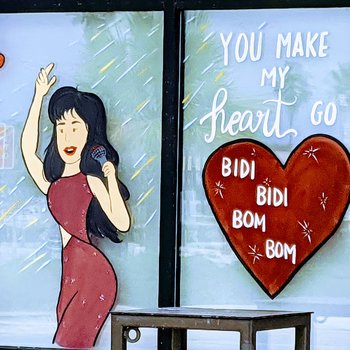Photograph of Anything for Selenas Window Painting ("You Make My Heart Go Bidi Bom Bom")