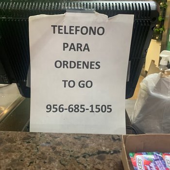 Photograph of "Telefono para Ordenes To Go" Sign