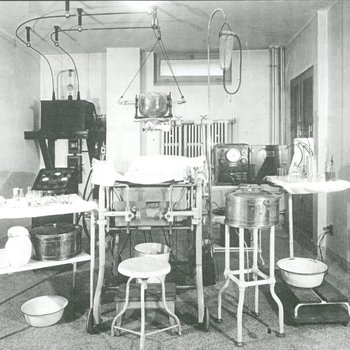 Room filled with medical equipment, early to mid 1900s