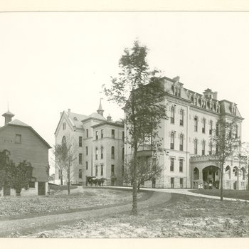 External view of Milwaukee Hospital building, 1884