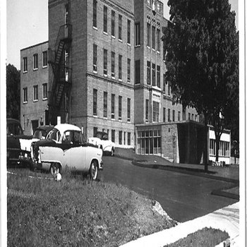 Parked cars outside of St. Joseph's Hospital, 1959