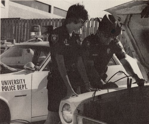 Photo of two University Police officers in uniform (1985)