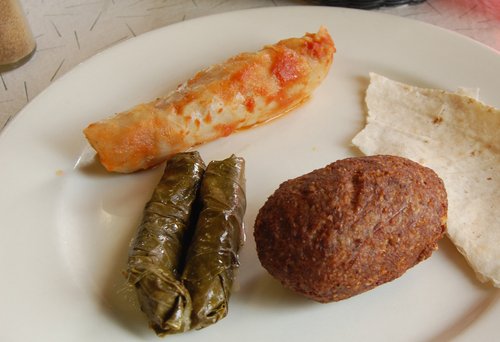 Cabbage+Rolls,+Stuffed+Grape+Leaves,+Kibbee,+and+Bread,+by+Amy+Evans