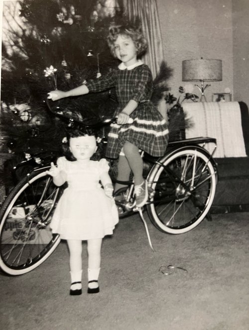 Dawn Benson: Christmas 1961 with first bike and Roberta doll