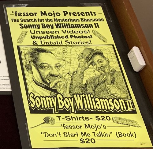 Poster: &#x27;fessor Mojo Presents The Search for the Mysterious Bluesman Sonny Boy Williamson II. Unseen videos! Unpublished photos! and untold stories! T-shirts, $20. Don&#x27;t Start Me Talkin (books), $20.
