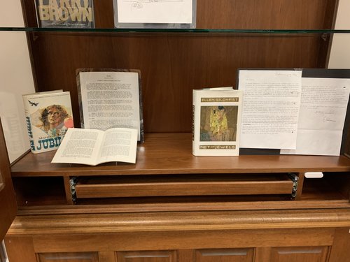 display case containing publications by Margaret Walker (Jubilee) and Ellen Gilchrist (Net of Jewels).