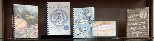 Row of 4 cookbooks