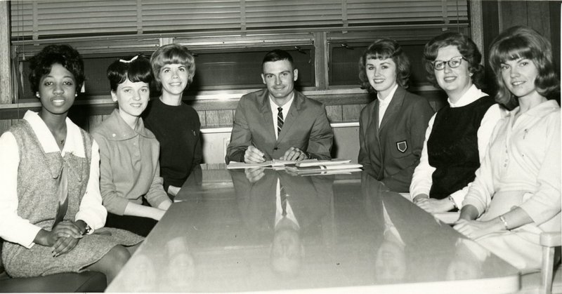 KSTA-NEA members sit around a table