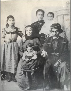 Alfred J Katool, Sr.’s paternal great-grandparents in Mount Lebanon, Syria, in 1898, with his father, Joseph Katool (top right), and others