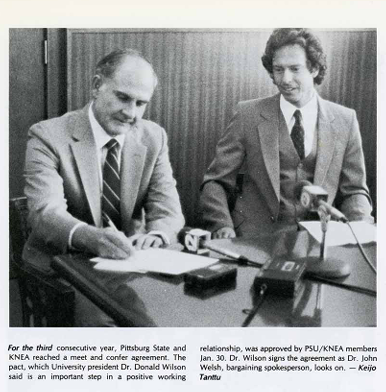 Dr. Donald Wilson and Dr. John Welsh sign meet and confer agreement, 1986