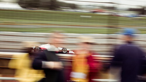 photo taken at the Indianapolis 500 to indicate the speed of the race cars