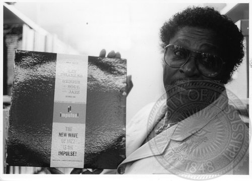 B. B. King visits the Blues Archive (11 June 1985), poses with his favorite record:  Genius + Soul = Jazz / Ray Charles (1961)
