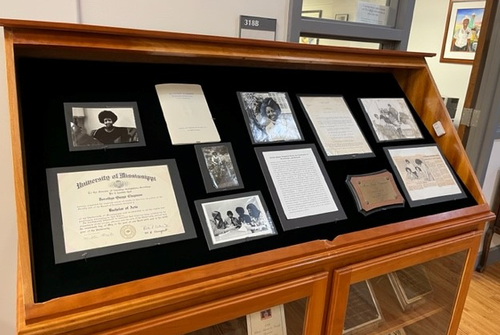 display case containing diploma, plaque, and photographs from Dorothye Quaye Chapman Reed Collection
