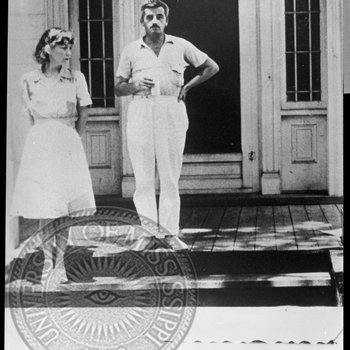 William Faulkner and Estelle on the steps of Rowan Oak