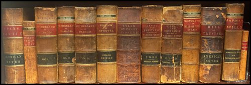 A shelf of rare books from the Harris Collection.