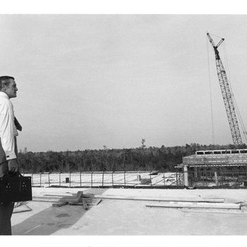 President Carpenter Surveys Construction, 1972