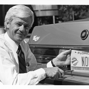 President McCray and First UNF License Plate, 1987