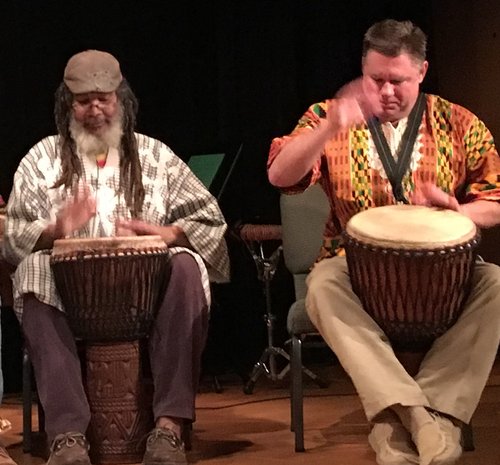 Wsir Johnson and Bob Damm play African drums
